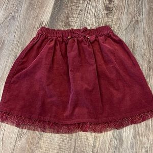 H&M pull on maroon corduroy skirt w lace gold sparkle trim. Never worn. US 6-8